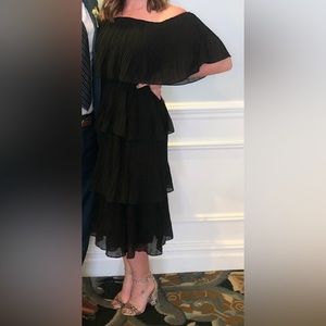 Off shoulder black pleated midi dress